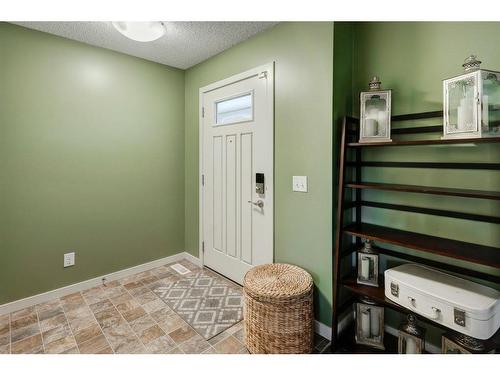 91 Sunset Road, Cochrane, AB - Indoor Photo Showing Other Room