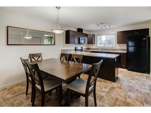 91 Sunset Road, Cochrane, AB - Indoor Photo Showing Dining Room