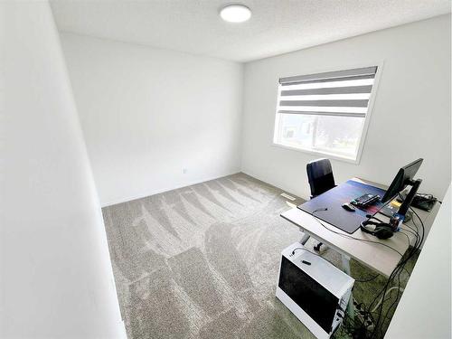 15 Coral Reef Close Ne, Calgary, AB - Indoor Photo Showing Office