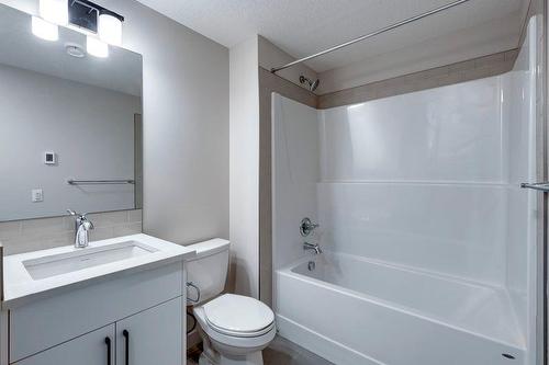 20 Emberside Grove, Cochrane, AB - Indoor Photo Showing Bathroom