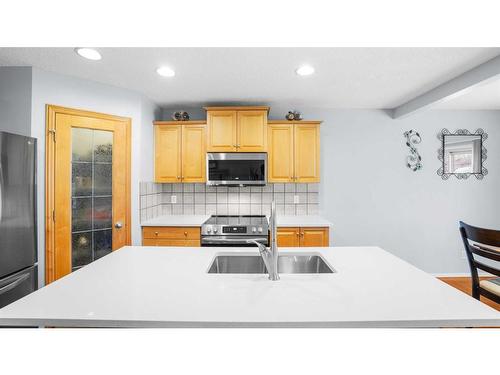 113 Covehaven Gardens Ne, Calgary, AB - Indoor Photo Showing Kitchen With Stainless Steel Kitchen With Double Sink With Upgraded Kitchen