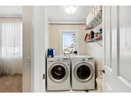 39 Everwillow Close Sw, Calgary, AB - Indoor Photo Showing Laundry Room