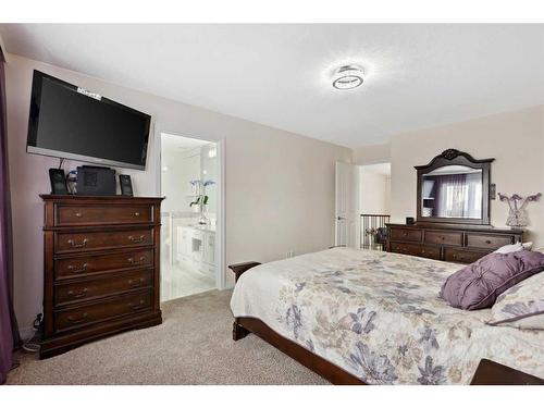 39 Everwillow Close Sw, Calgary, AB - Indoor Photo Showing Bedroom