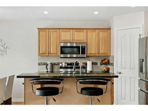 39 Everwillow Close Sw, Calgary, AB - Indoor Photo Showing Kitchen With Stainless Steel Kitchen With Double Sink