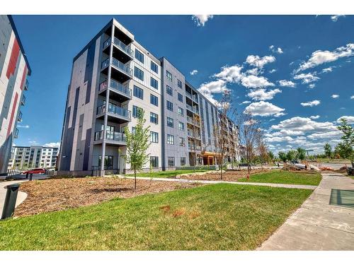 1616-60 Skyview Ranch Road Ne, Calgary, AB - Outdoor With Balcony With Facade