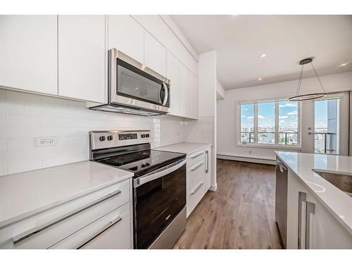 1616-60 Skyview Ranch Road Ne, Calgary, AB - Indoor Photo Showing Kitchen With Upgraded Kitchen