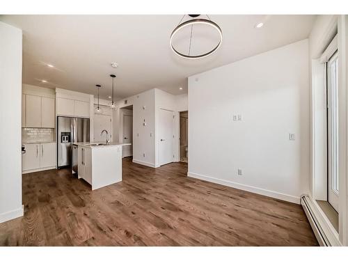 2311-111 Wolf Creek Drive Se, Calgary, AB - Indoor Photo Showing Kitchen