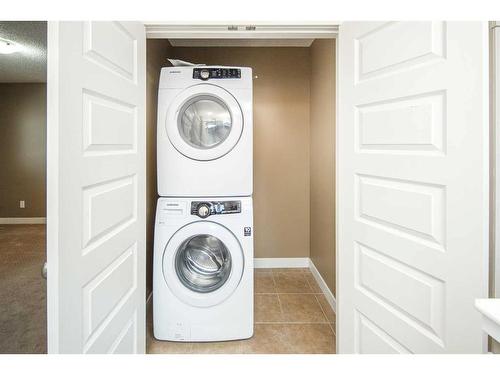 254 Covecreek Circle Ne, Calgary, AB - Indoor Photo Showing Laundry Room