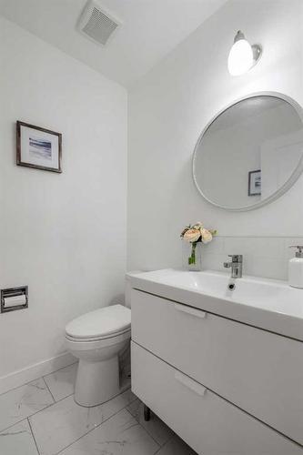 91 Midglen Way Se, Calgary, AB - Indoor Photo Showing Bathroom