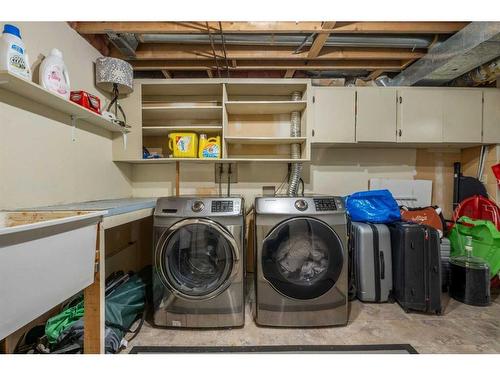 91 Midglen Way Se, Calgary, AB - Indoor Photo Showing Laundry Room