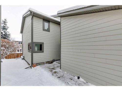 33-185 Woodridge Drive Sw, Calgary, AB - Outdoor With Exterior