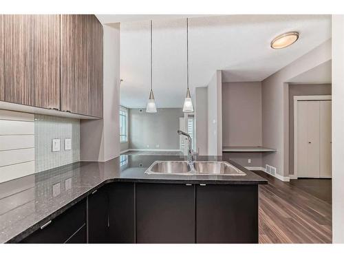 603-788 12 Avenue Sw, Calgary, AB - Indoor Photo Showing Kitchen With Double Sink