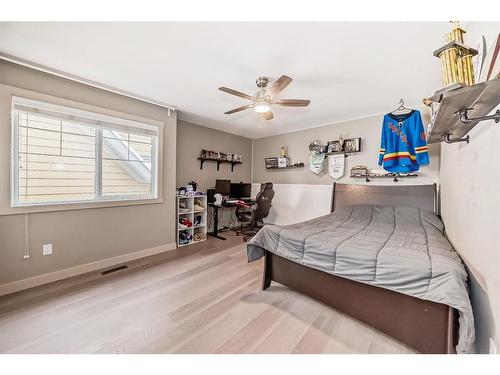 136 Riviera Way, Cochrane, AB - Indoor Photo Showing Bedroom