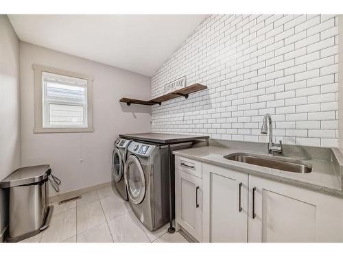 136 Riviera Way, Cochrane, AB - Indoor Photo Showing Laundry Room