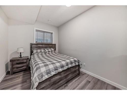 136 Riviera Way, Cochrane, AB - Indoor Photo Showing Bedroom