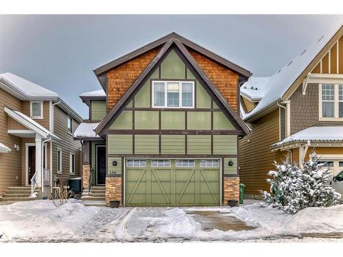 136 Riviera Way, Cochrane, AB - Outdoor With Facade