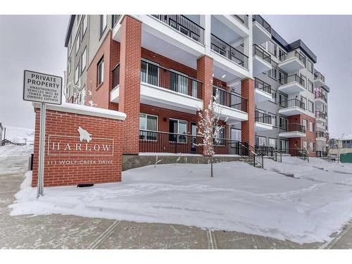 1208-111 Wolf Creek Drive, Calgary, AB - Outdoor With Balcony With Facade