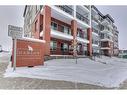 1208-111 Wolf Creek Drive, Calgary, AB  - Outdoor With Balcony With Facade 