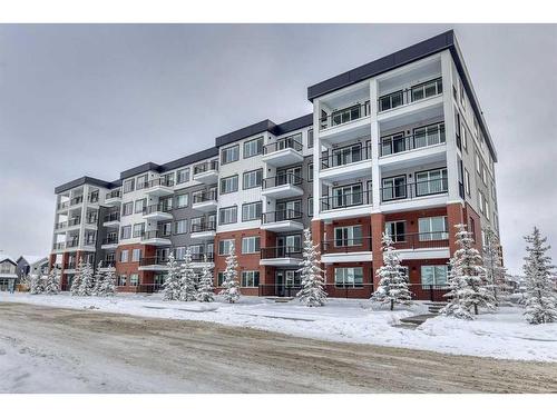 1208-111 Wolf Creek Drive, Calgary, AB - Outdoor With Balcony With Facade