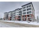 1208-111 Wolf Creek Drive, Calgary, AB  - Outdoor With Balcony With Facade 