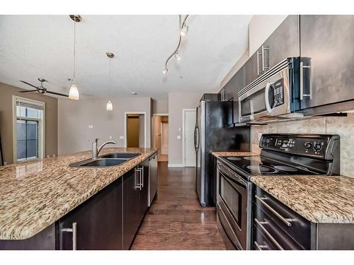 10-2307 14 Street Sw, Calgary, AB - Indoor Photo Showing Kitchen With Stainless Steel Kitchen With Double Sink With Upgraded Kitchen