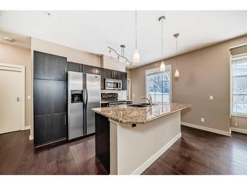 10-2307 14 Street Sw, Calgary, AB - Indoor Photo Showing Kitchen With Stainless Steel Kitchen With Double Sink With Upgraded Kitchen