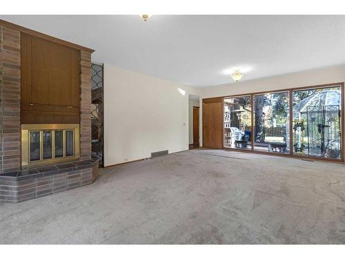 43 Pineland Close Ne, Calgary, AB - Indoor With Fireplace