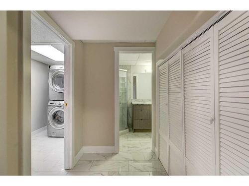 224 Queen Charlotte Way Se, Calgary, AB - Indoor Photo Showing Laundry Room