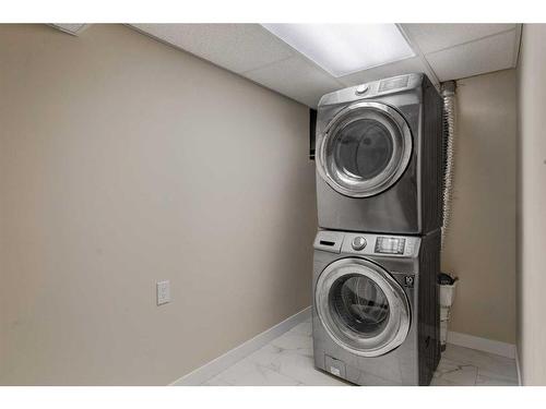 224 Queen Charlotte Way Se, Calgary, AB - Indoor Photo Showing Laundry Room