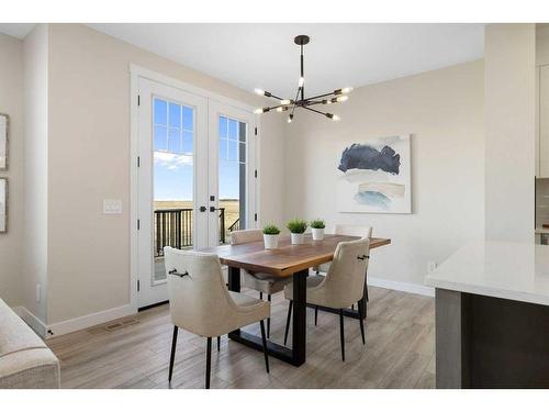 487 Kinniburgh Loop, Chestermere, AB - Indoor Photo Showing Dining Room