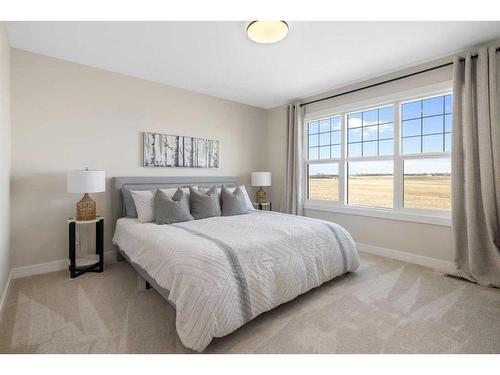 487 Kinniburgh Loop, Chestermere, AB - Indoor Photo Showing Bedroom