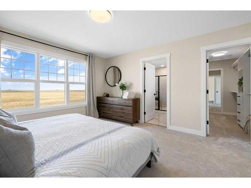 487 Kinniburgh Loop, Chestermere, AB - Indoor Photo Showing Bedroom