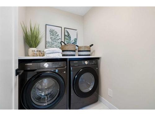 487 Kinniburgh Loop, Chestermere, AB - Indoor Photo Showing Laundry Room