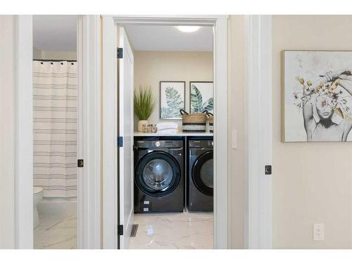 487 Kinniburgh Loop, Chestermere, AB - Indoor Photo Showing Laundry Room