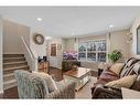 124 Panamount Way Nw, Calgary, AB  - Indoor Photo Showing Living Room 