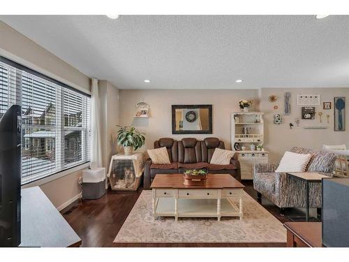 124 Panamount Way Nw, Calgary, AB - Indoor Photo Showing Living Room