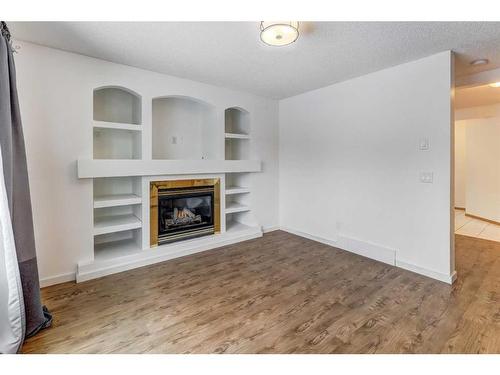 23 Saddleback Way Ne, Calgary, AB - Indoor With Fireplace