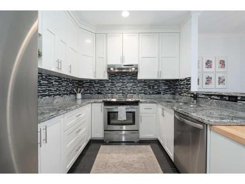 304-916 19 Avenue Sw, Calgary, AB - Indoor Photo Showing Kitchen With Stainless Steel Kitchen With Upgraded Kitchen