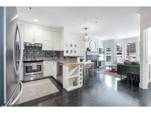 304-916 19 Avenue Sw, Calgary, AB - Indoor Photo Showing Kitchen With Stainless Steel Kitchen With Upgraded Kitchen