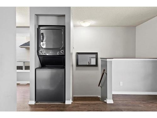 8 Taraglen Road Ne, Calgary, AB - Indoor Photo Showing Laundry Room