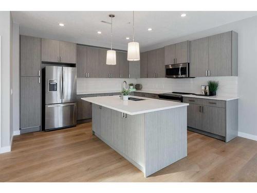 1732 25 Avenue Sw, Calgary, AB - Indoor Photo Showing Kitchen With Double Sink With Upgraded Kitchen