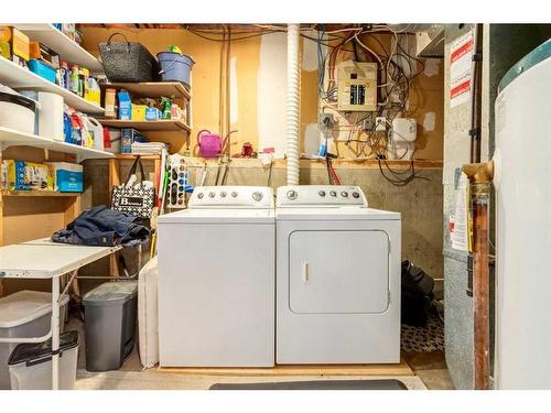 28 Midlawn Place Se, Calgary, AB - Indoor Photo Showing Laundry Room