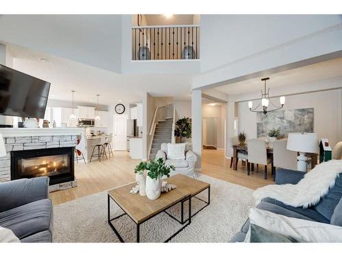 16 Ridge View Close, Cochrane, AB - Indoor Photo Showing Living Room With Fireplace