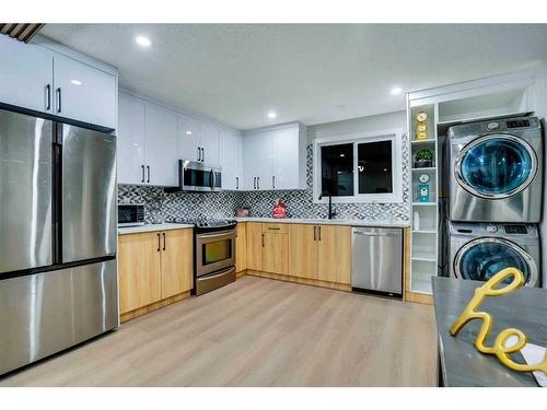 180 Fallswater Road Ne, Calgary, AB - Indoor Photo Showing Kitchen