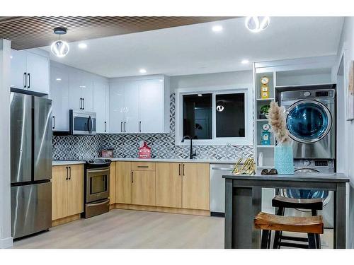 180 Fallswater Road Ne, Calgary, AB - Indoor Photo Showing Kitchen