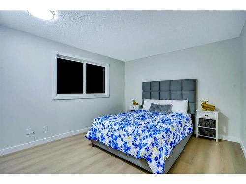 180 Fallswater Road Ne, Calgary, AB - Indoor Photo Showing Bedroom