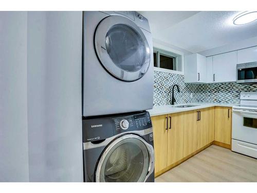 180 Fallswater Road Ne, Calgary, AB - Indoor Photo Showing Laundry Room