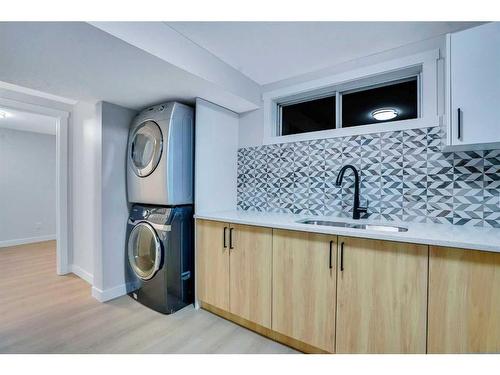 180 Fallswater Road Ne, Calgary, AB - Indoor Photo Showing Laundry Room