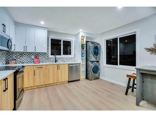 180 Fallswater Road Ne, Calgary, AB - Indoor Photo Showing Kitchen