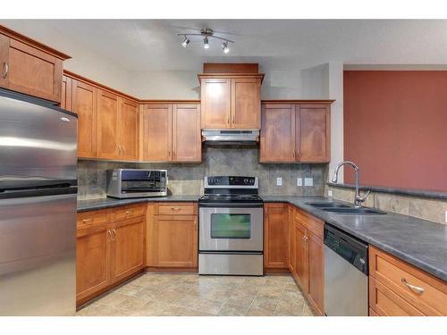 518-10 Discovery Ridge Close Sw, Calgary, AB - Indoor Photo Showing Kitchen With Double Sink